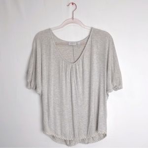 Size XS. Slightly oversized. New York and company runs big!